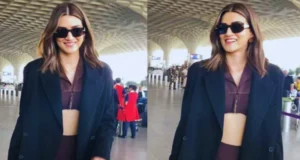 Kriti Sanon SLAYS in her airport look with brown cut-out mini dress, oversized black blazer